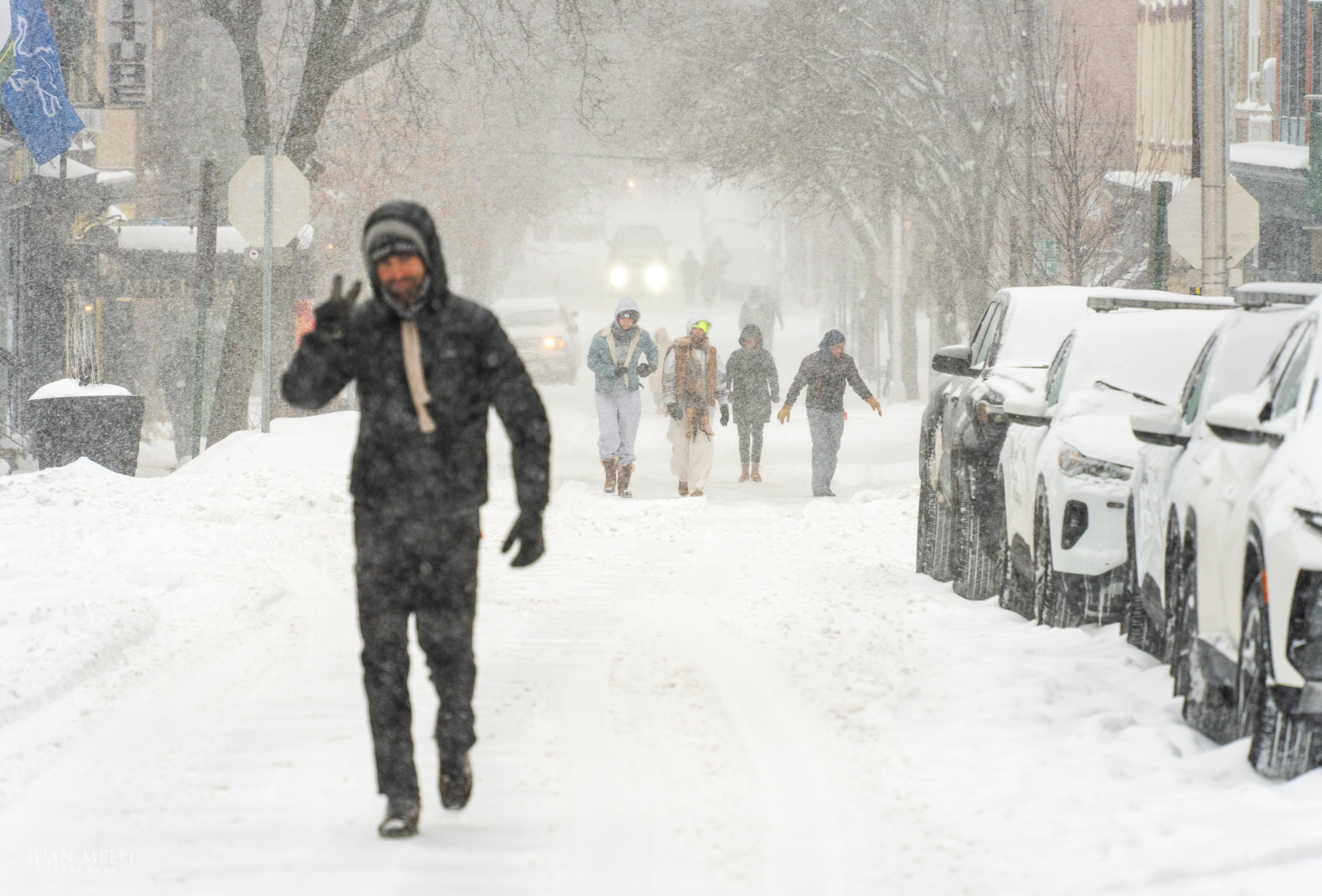 Pedestrians walking along 1st Street
