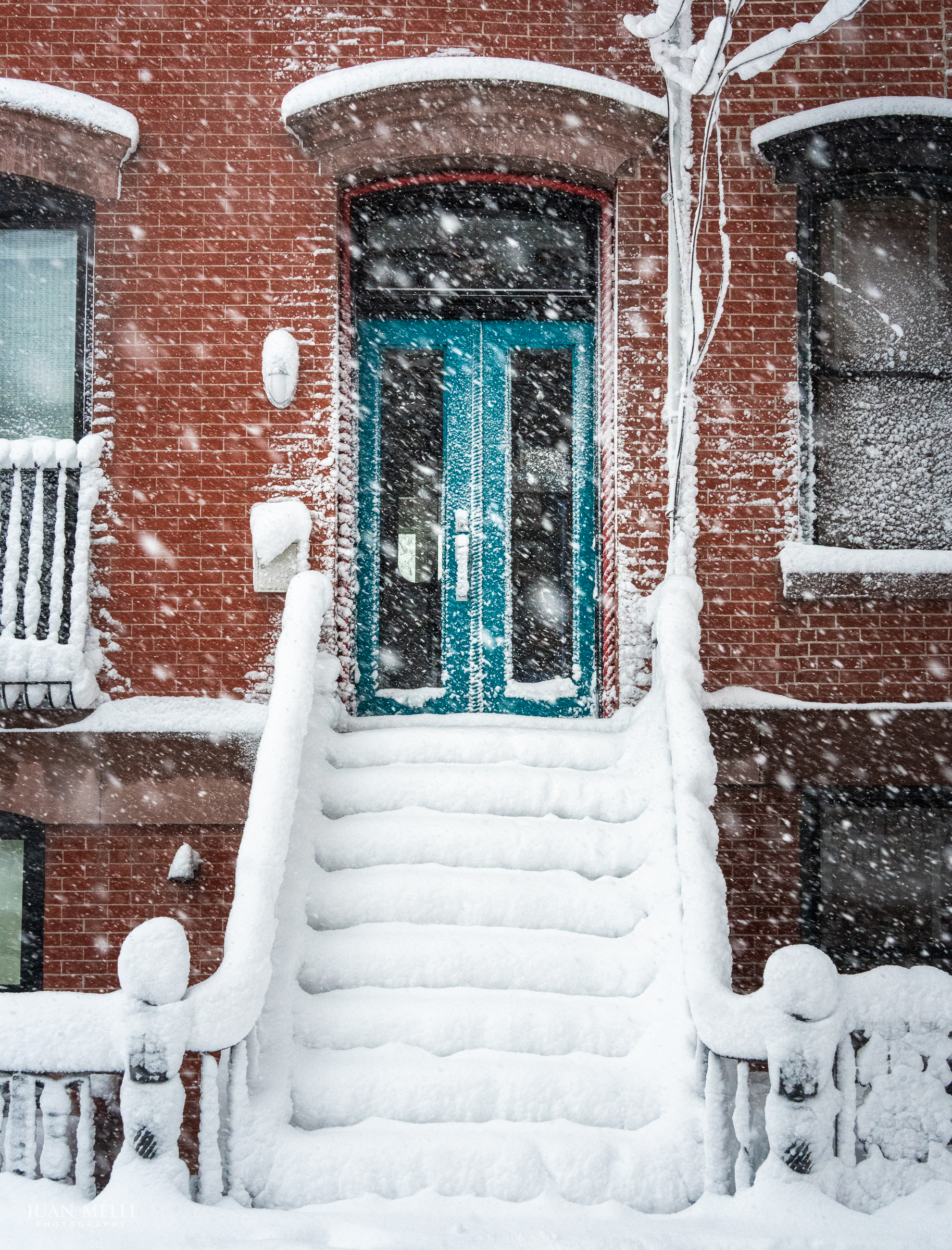 Brick, snow, and a pop of teal.